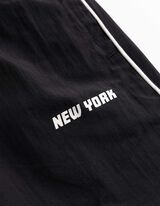 Sportovn&iacute; kalhoty - Vodoodpudiv&aacute; - cern&aacute;