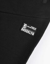 spodnie joggingowe - naszywka z logo - czarny