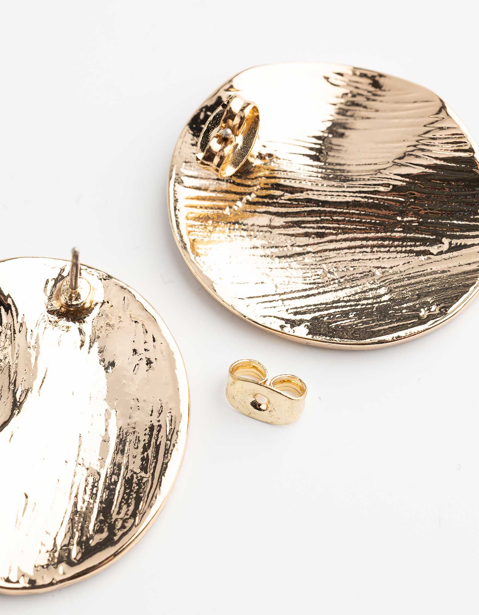 des boucles d'oreilles - Or