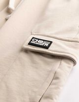 &Scaron;ortai su ki&scaron;enėmis - Trikotažas - smelio spalvos