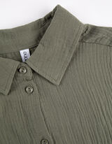 Mar&scaron;kiniai - Muslinas - tamsiai zalias