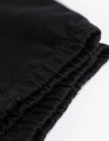 spodnie joggingowe - jednokolorowy - czarny