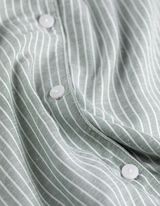 S&auml;rgist ja l&uuml;hikestest p&uuml;kstest koosnev pidžaamakomplekt  - linane look - tumeroheline