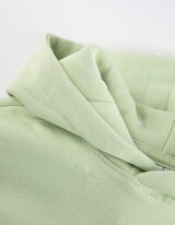 Kapucnis felső - H&aacute;tul nyomtatott minta - vilagos zold