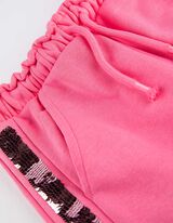 Pantaloni da jogging - Paillettes doubleface - rosa fucsia