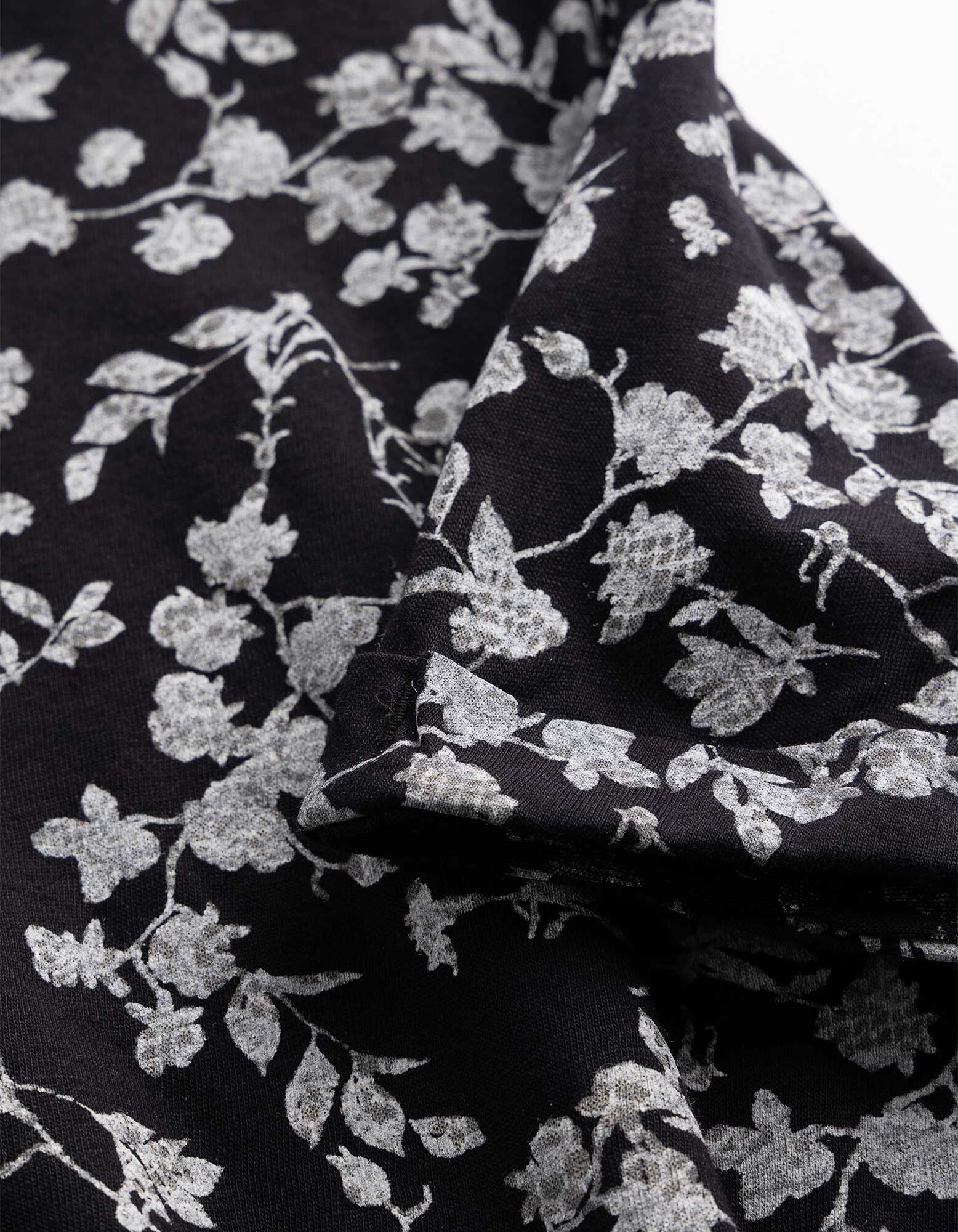 T-shirt - Motief all-over - Zwart