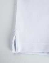 Polo - Chiusura tramite bottone - bianco