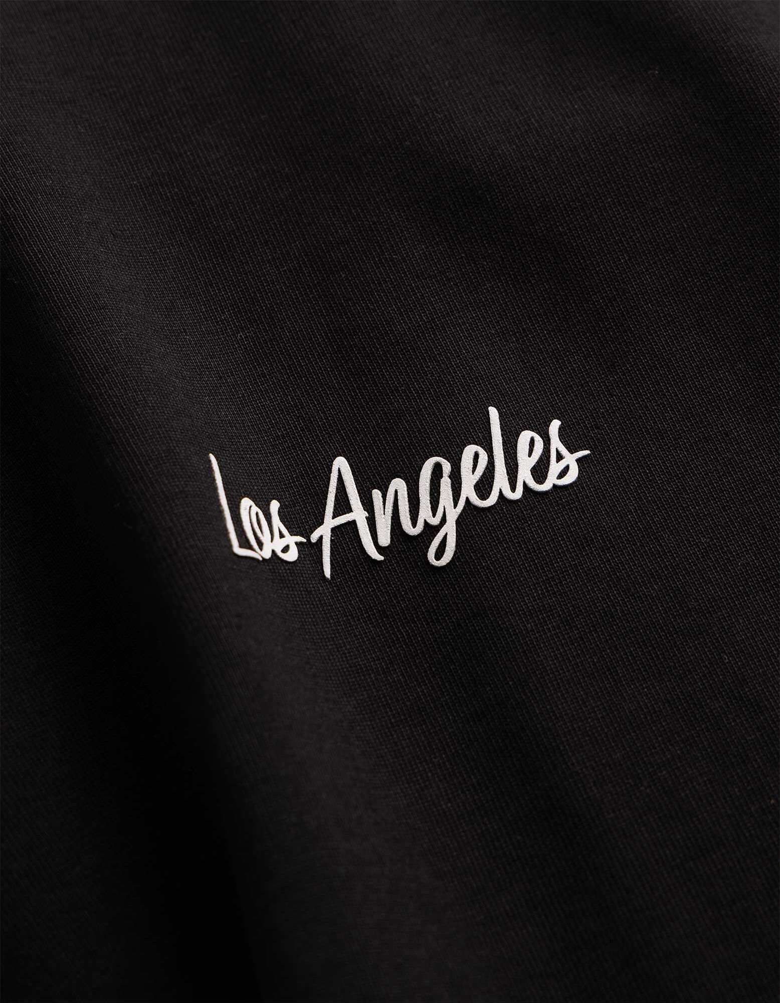 T-Shirt - Loose Fit - Schwarz