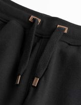 Joggingov&eacute; kalhoty - Klasick&yacute; střih Regular Fit - Čern&aacute;