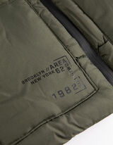 Prešívaná vesta - Reflexný prvok - tmavozelena