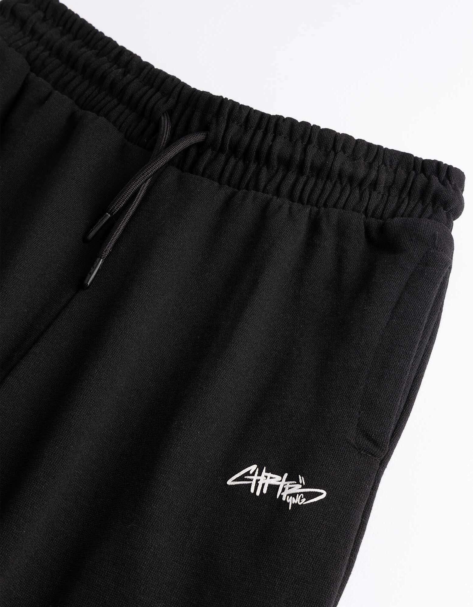 Joggingov&eacute; kalhoty - Voln&yacute; střih Relaxed Fit - Čern&aacute;