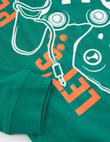 Pikkade varrukatega s&auml;rgist ja p&uuml;kstest koosnev komplekt - tr&uuml;kis - roheline