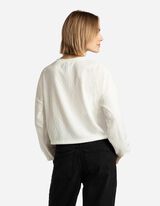 sweter - troczek na dole - bialy