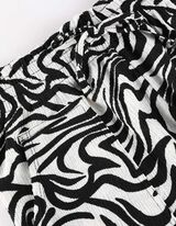 T-s&auml;rk - Oversized-l&otilde;ikega - must