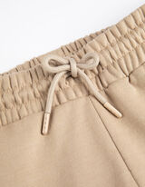 Bėgiojimo kelnės - Laisvalaikio stiliaus - tamsaus smelio spalvos