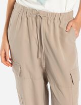 Kelnės su ki&scaron;enėmis - smelio spalvos