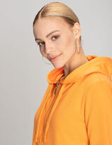 Cipz&aacute;ros meleg&iacute;tőfelső - Kapucni - narancs