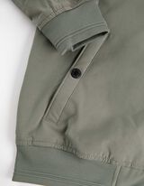 striukė - Nepraleidžia vėjo - sviesiai zalias