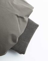 Kab&aacute;t - Skryt&yacute; zips - tmavozelena