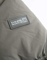 Kab&aacute;t - Skryt&yacute; zips - tmavozelena