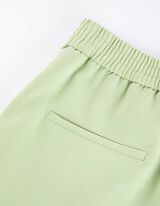 Hlače za obleko - Kroj Tapered Fit - svetlo zelena