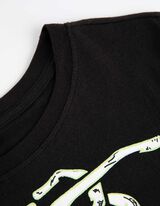 Hossz&uacute; ujj&uacute; ingből &eacute;s nadr&aacute;gb&oacute;l &aacute;ll&oacute; pizsama szett  - Vil&aacute;g&iacute;t a s&ouml;t&eacute;tben - fekete