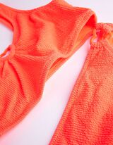 Bikiinitopist ja -p&uuml;kstest koosnev komplekt - soonikuline struktuur - oranzh