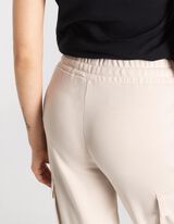 Bėgiojimo kelnės - Uždėtinės ki&scaron;enės - smelio spalvos