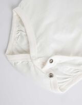 Pikkade varrukatega bodist, pükstest, T-särgist, sipupükstest ja pudipõllest koosnev komplekt - allover-trükk - beezh