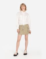 Sijonas su ki&scaron;enėmis - Uždėtinės ki&scaron;enės - smelio spalvos