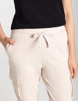 Bėgiojimo kelnės - Uždėtinės ki&scaron;enės - smelio spalvos