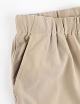 Kelnės su ki&scaron;enėmis - smelio spalvos