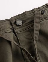 Cargo kalhoty - Zap&iacute;n&aacute;n&iacute; na knofl&iacute;k a zip - tmave zelena